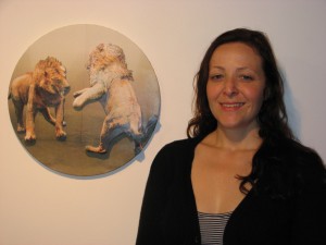 Rose next to her work, Matched opponents, 2010 paper collage, 400 mm diameter